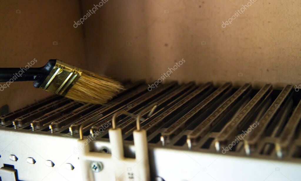 Clean the gas boiler heat exchanger with a brush. malfunction prevention