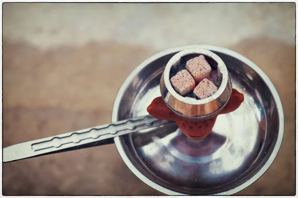 hot coals for hookah in the bowl.
