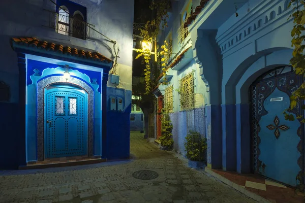 Fantastic night view at traditional moroccan architectural details.  Blue street walls of the popular city of Morocco, Chefchaouen. Chefchaouen is a religious blue town among the mountains.