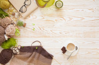 Yün iplik kumaş örme. Turkuaz eski yeni arka plan yaşlı. Siyah kahve ve çikolata.