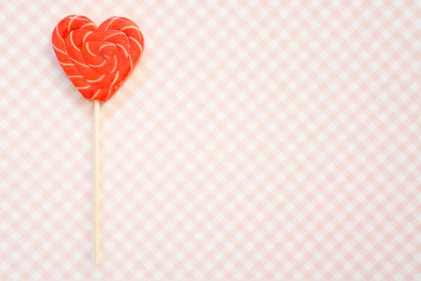 Kırmızı Pembe Lolipop Kalp Şeklinde Şeker — Stok fotoğraf