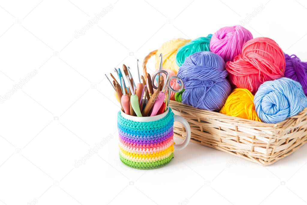 Color yarn for knitting, knitting needles and crochet hooks. White background. Isolate.