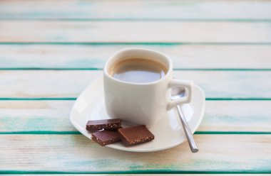 Yün iplik kumaş örme. Turkuaz eski yeni arka plan yaşlı. Siyah kahve ve çikolata.