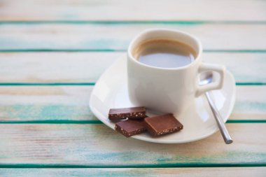 Yün iplik kumaş örme. Turkuaz eski yeni arka plan yaşlı. Siyah kahve ve çikolata.