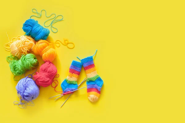 Colored balls of yarn. Rainbow colors. All colors. Yarn for knitting. Skeins of yarn.