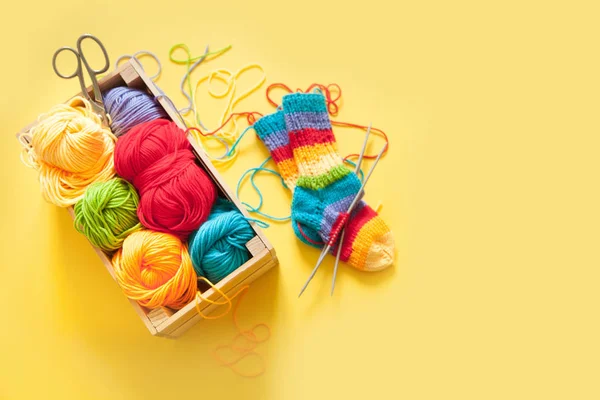 Colored balls of yarn. Rainbow colors. All colors. Yarn for knitting. Skeins of yarn.