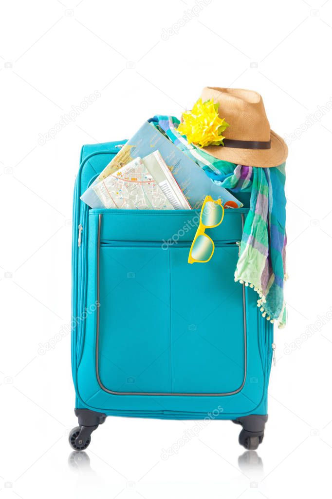 Color travel suitcase. Suitcase Packed to Vacation