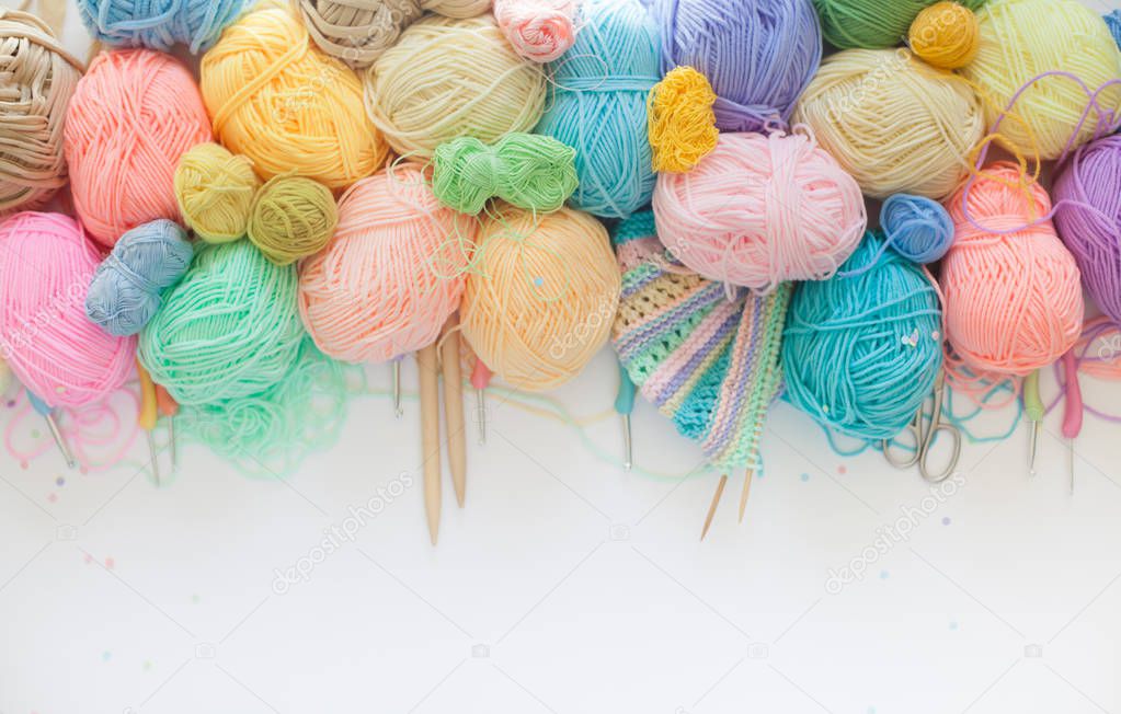 Color yarn for knitting, knitting needles and crochet hooks. White background. Isolate.