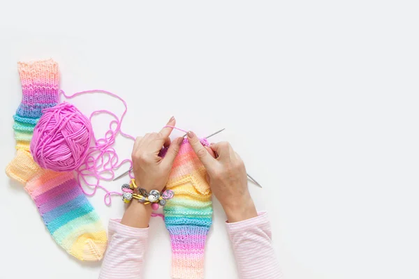 Colored balls of yarn. View from above. Rainbow colors. All colors. Yarn for knitting. Skeins of yarn.