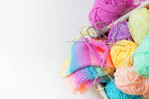 Colored balls of yarn. View from above. Rainbow colors. All colors. Yarn for knitting. Skeins of yarn.