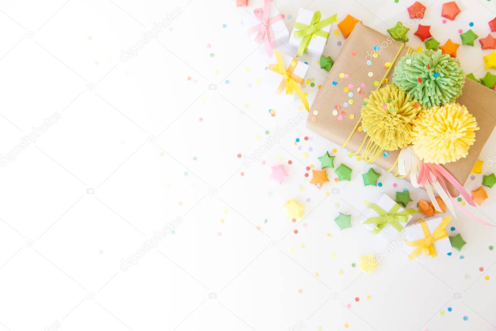 Bright gifts for a party, birthday or a new year. Confetti, stars, garlands, crackers.