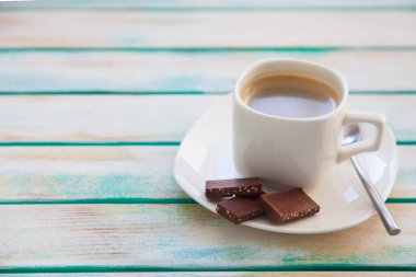 Yün iplik kumaş örme. Turkuaz eski yeni arka plan yaşlı. Siyah kahve ve çikolata.