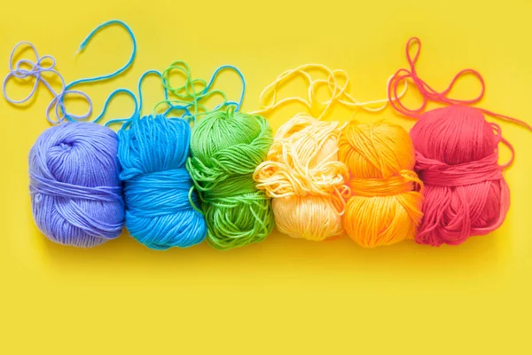 Colored balls of yarn. Rainbow colors. All colors. Yarn for knitting. Skeins of yarn.