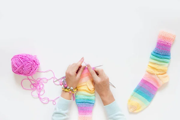 Colored balls of yarn. View from above. Rainbow colors. All colors. Yarn for knitting. Skeins of yarn.