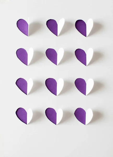 Paper hearts cut from paper.