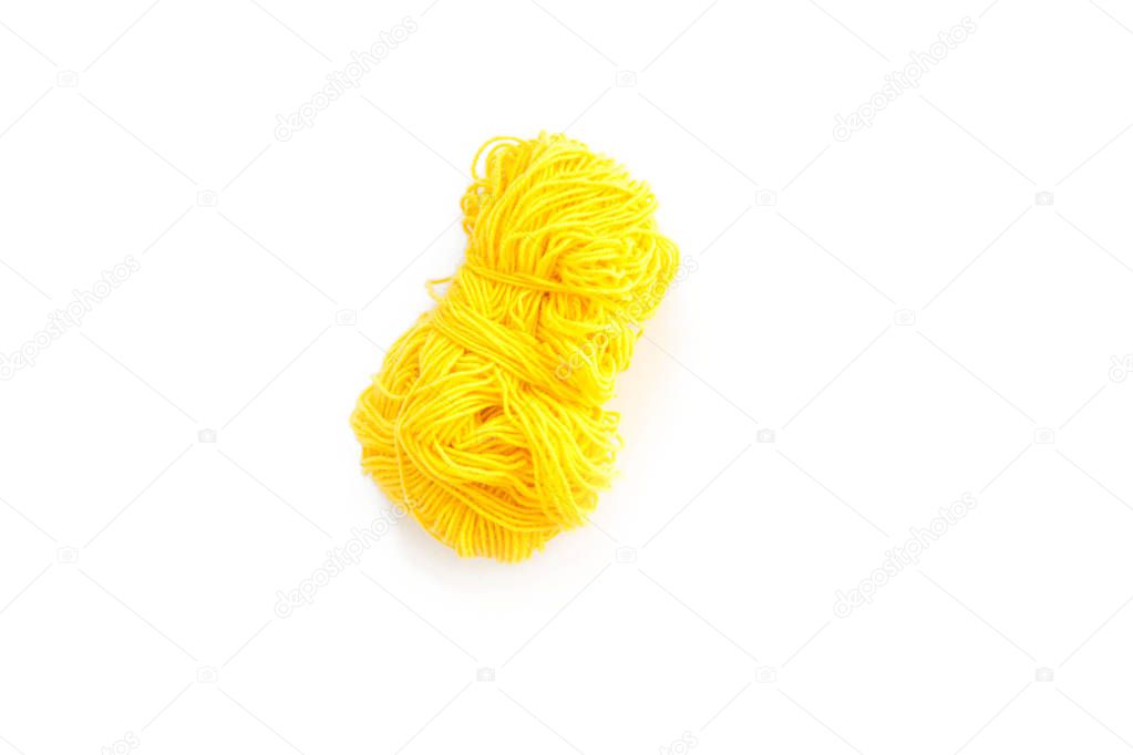 Yarn for knitting. White background. Hanks and balls with thread.