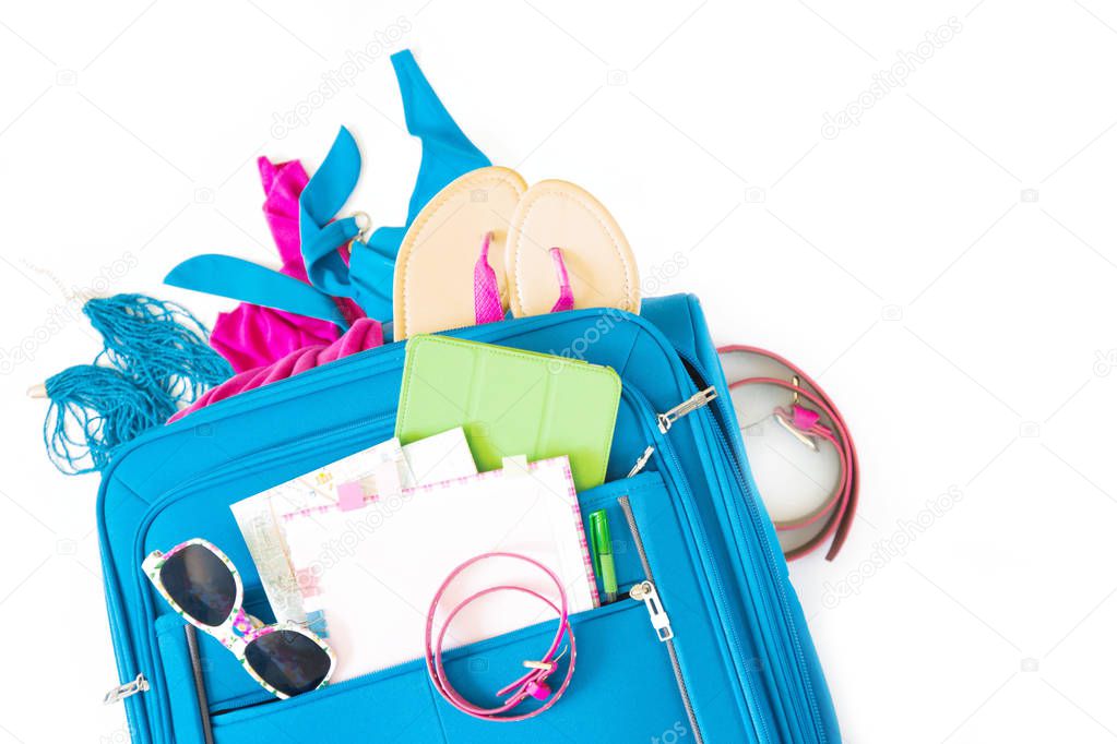 Colored bright things for rest and travel. Planning a vacation. Blue, turquoise, aquamarine, purple, lilac, pink, purple.