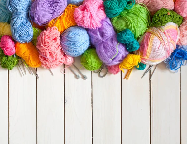 Colored balls of yarn. Rainbow colors. Yarn for knitting. Skeins of yarn.