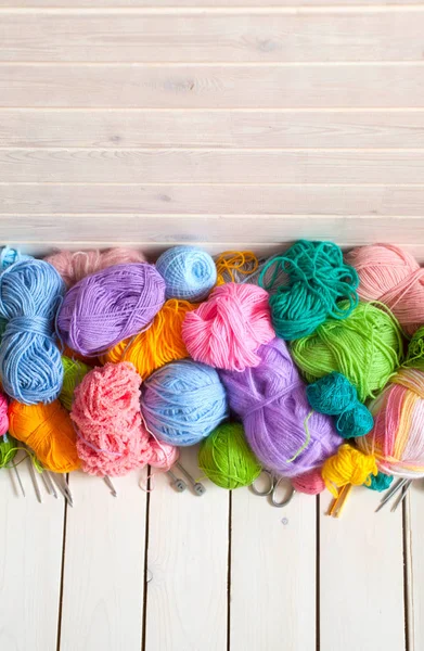 Colored balls of yarn. Rainbow colors. Yarn for knitting. Skeins of yarn.