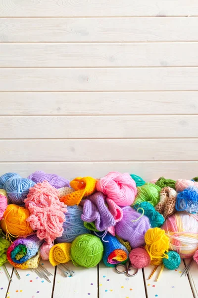 Colored balls of yarn. Rainbow colors. Yarn for knitting. Skeins of yarn.