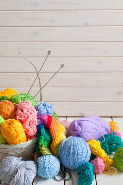 Colored balls of yarn. Rainbow colors. Yarn for knitting. Skeins of yarn.