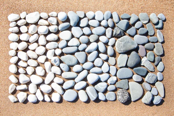 White Pebble Stones Lie Sandy Background — Stock Photo, Image