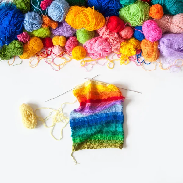 Colored balls of yarn. View from above. Rainbow colors. All colors. Yarn for knitting. Skeins of yarn.