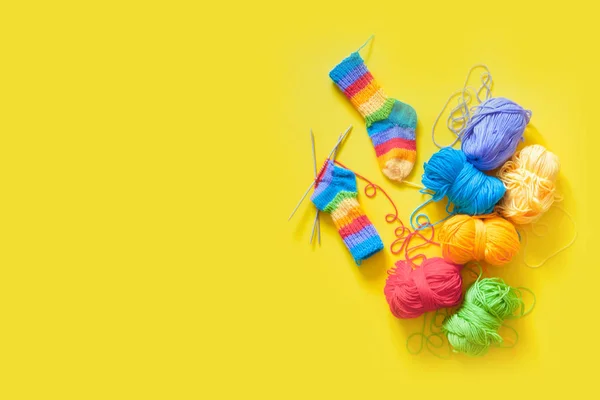 Colored balls of yarn. Rainbow colors. All colors. Yarn for knitting. Skeins of yarn.