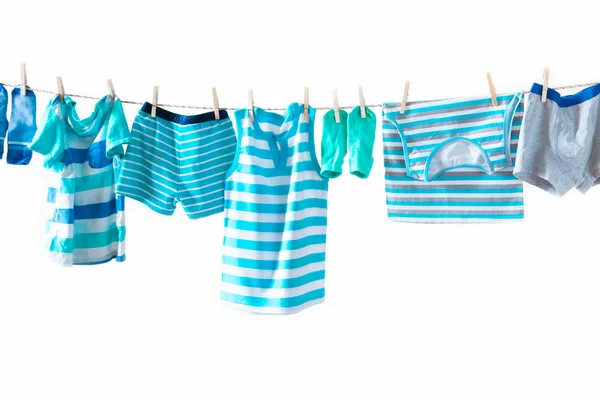 Clothesline Con Appeso Vestiti Bambino Sfondo Giallo — Foto Stock