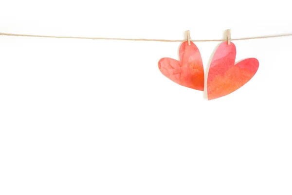 Dekoratív koszorú, rózsaszín és piros szívek. Képeslapot a Valentin — Stock Fotó