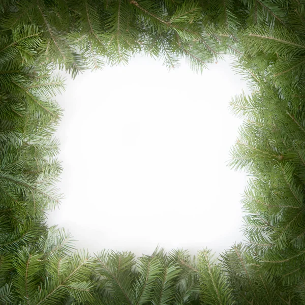 Χριστουγεννιάτικο πράσινο τετράγωνο πλαίσιο που απομονώνονται σε λευκό φόντο. G — Φωτογραφία Αρχείου
