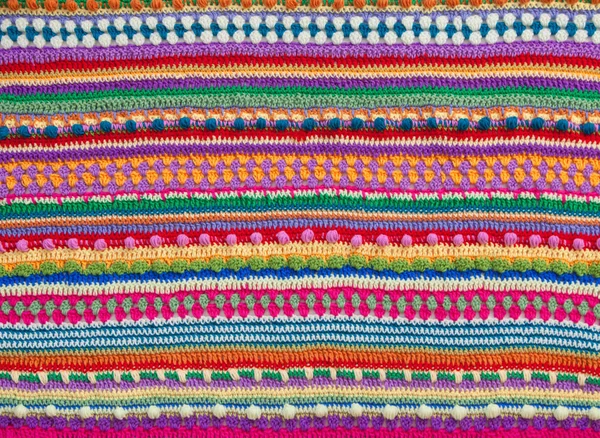 Knitted color background. Knitted texture. A sample of knitting — Stock Photo, Image