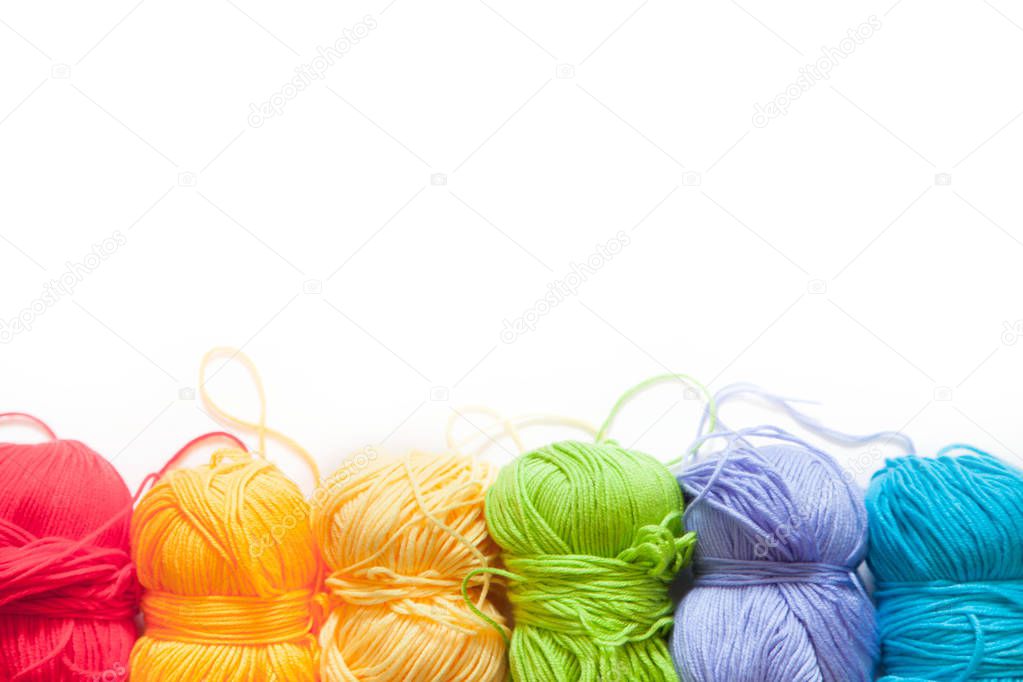 Colored balls of yarn. View from above. Rainbow colors. All colors. Yarn for knitting. Skeins of yarn.