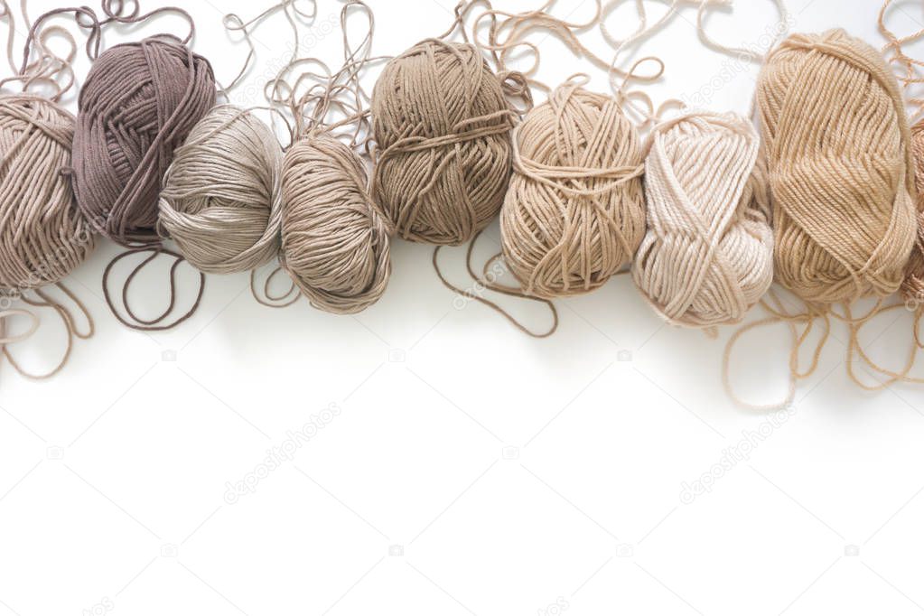 Wool and cotton yarn for knitting of neutral natural color. Back