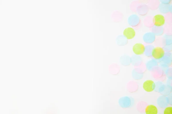 Frame made of colored confetti. White background — Stock Photo, Image