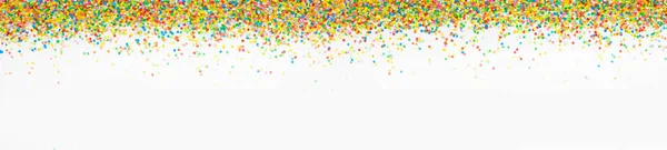 Frame gemaakt van gekleurde confetti. Witte achtergrond — Stockfoto