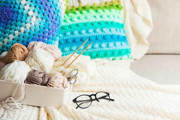 Yarn in a basket of beige and neutral, natural tones, knitting a — Stock Photo, Image
