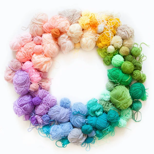 Color wheel of yarn. Rainbow and spectrum. White background. Thr