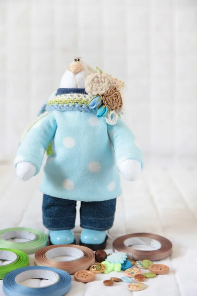 Handmade toy. Doll of textiles, fabrics and yarn. Rabbit blue se