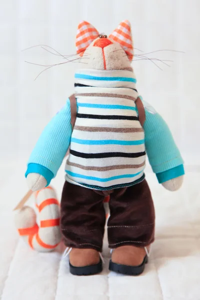 Handmade toy. Doll of textiles, fabrics and yarn. Cat sewn by ha