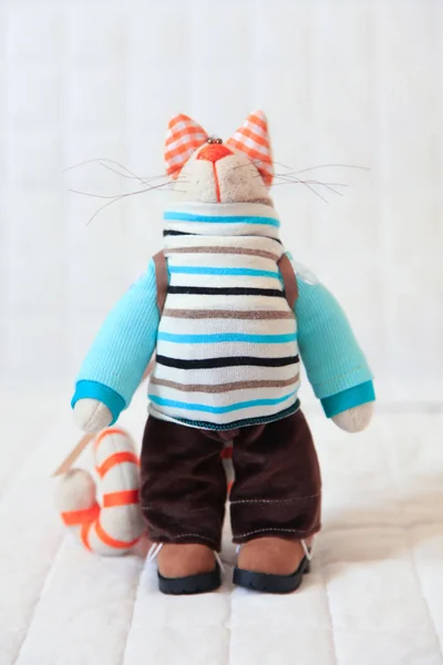 Handmade toy. Doll of textiles, fabrics and yarn. Cat sewn by ha