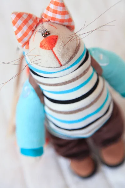 Handmade toy. Doll of textiles, fabrics and yarn. Cat sewn by ha