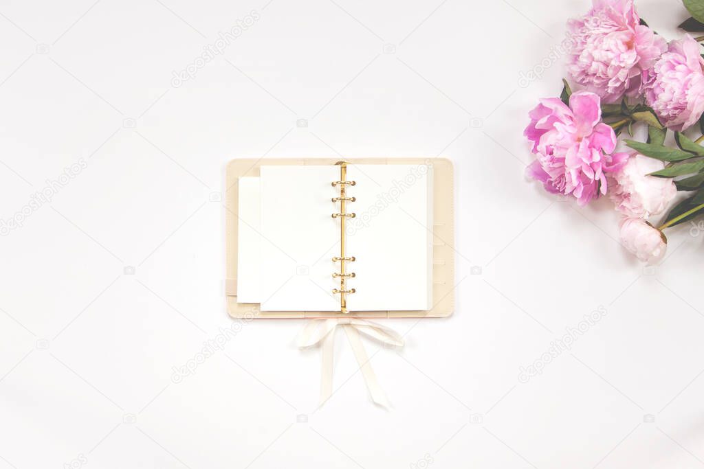Office supplies are gold and white. Concept female desktop.