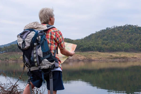 Young Man Trekker Use Map Enjoy Traveling Backpack Hiking Concept — Stock Photo, Image