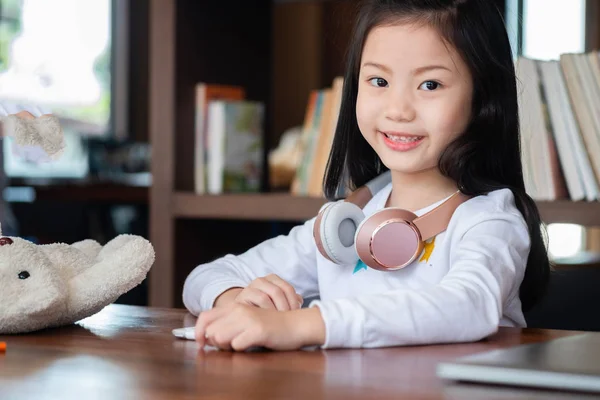 Cute Girl Smile Sitdown Playing Tablet Smartphone Library Children Concept — Stock Photo, Image