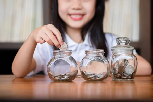 Cute Girl Putting Money Coins Glass Saving Money Concept — Stock Photo, Image