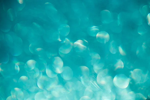 bokeh turkuaz arka plan üzerinde bulanıklık.