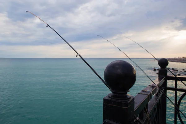 olta çubukları, denizde balıkçılık, gün batımı