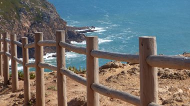 Wooden Posts Along Beach,  Cliffside 