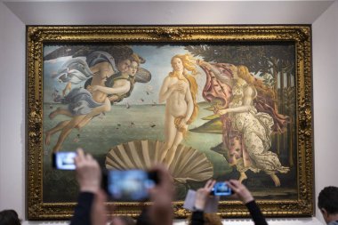 FLORENCE, ITALY - FEBRUARY 18, 2019: Tourist hands lifting cell phones to take picture of famous Birth of Venus painting in museum clipart